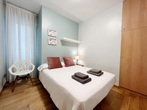 Postel nebo postele na pokoji v ubytování Gracia Village Barcelona