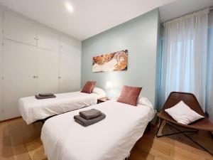 Postel nebo postele na pokoji v ubytování Gracia Village Barcelona
