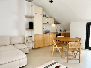 A seating area at Peral Old Town Penthouse II - EaW Homes