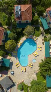 an overhead view of a swimming pool in a resort at Villa Alisa in Fethiye