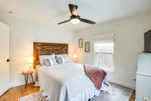 a bedroom with a bed and a ceiling fan at Frisco Vacation Rental in Rail District with Hot Tub in Frisco