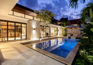 an image of a swimming pool in a house at Billi Bali Villa in Canggu