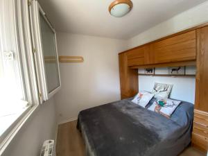 Posteľ alebo postele v izbe v ubytovaní La Marmotaine, T2 bis, Parking privé, Balcon vue montagne