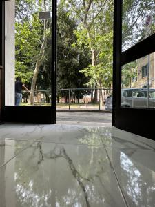 an open door with a marble floor in front of a building at Dream holiday in Mestre