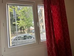 a window with a view of a car at Dream holiday in Mestre