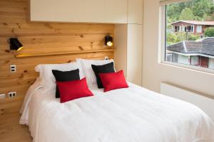 Postel nebo postele na pokoji v ubytování Del Pescador Hotel Cabañas