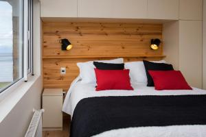 Postel nebo postele na pokoji v ubytování Del Pescador Hotel Cabañas