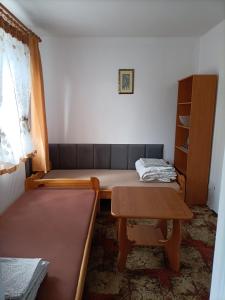 Posteľ alebo postele v izbe v ubytovaní Jasionka 2