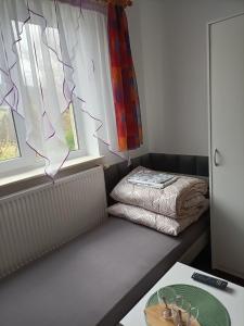 Posteľ alebo postele v izbe v ubytovaní Jasionka 2