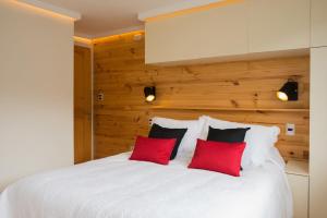 Postel nebo postele na pokoji v ubytování Del Pescador Hotel Cabañas