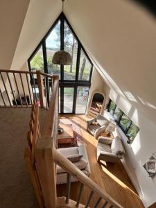 an overhead view of a living room with stairs at Toad Hall in Grimston