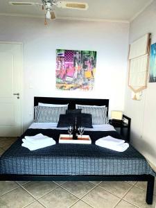 Ένα ή περισσότερα κρεβάτια σε δωμάτιο στο Filis mare apartment