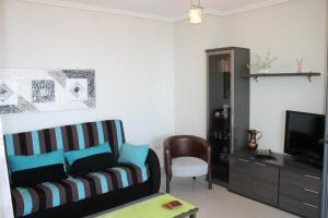 Część wypoczynkowa w obiekcie Apartment Carmentxu Gemelos 26