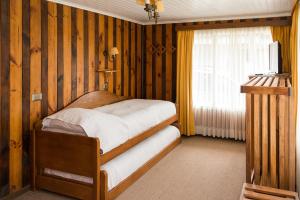 Postel nebo postele na pokoji v ubytování Del Pescador Hotel Cabañas