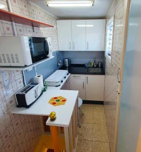 Кухня или мини-кухня в Acogedor duplex en el centro de Santa Cruz
