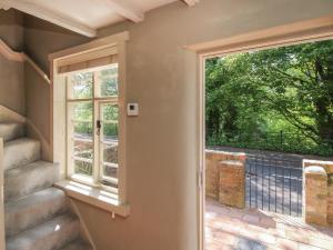 a door leading into aoyer with a window at Number 5 in Telford