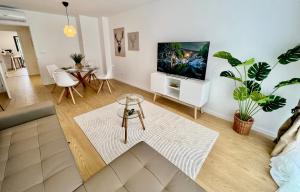 Televízia a/alebo spoločenská miestnosť v ubytovaní Balnea Casa Victoria