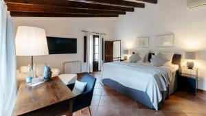 Posteľ alebo postele v izbe v ubytovaní Finca Can Coll Boutique Country House - Adults Only