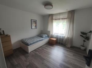 Postel nebo postele na pokoji v ubytování Gasthaus L&A Kunz
