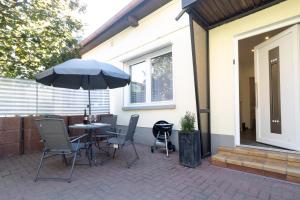 Un patio sau altă zonă în aer liber la Haus Oselbach- Gemütlich, Zentral, Modern