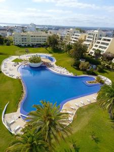 an overhead view of a swimming pool in a resort at T2+1 - Sousa Vila - Apartament with the best pool @ Algarve in Alvor