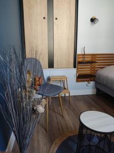 Ένα ή περισσότερα κρεβάτια σε δωμάτιο στο Duplex cosy hyper centre