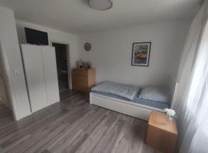 Postel nebo postele na pokoji v ubytování Gasthaus L&A Kunz