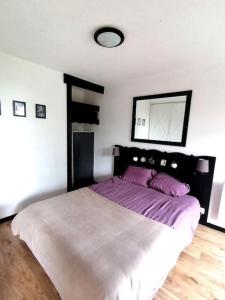 Postel nebo postele na pokoji v ubytování Le Chamroussien - Appartement 1700