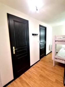 Postel nebo postele na pokoji v ubytování Le Chamroussien - Appartement 1700