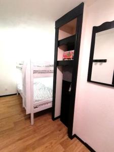 Postel nebo postele na pokoji v ubytování Le Chamroussien - Appartement 1700