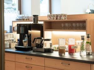 Coffee and tea making facilities at Hotel B&B Martha