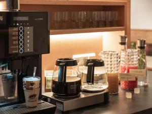 Coffee and tea making facilities at Hotel B&B Martha