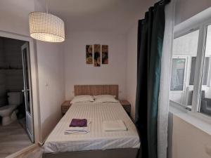 Postel nebo postele na pokoji v ubytování Zapp House