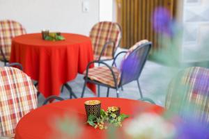 A restaurant or other place to eat at Hotel B&B Martha