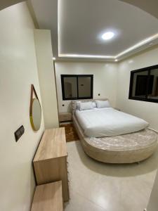 Katil atau katil-katil dalam bilik di Le ruban d’or