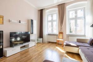 TV a/nebo společenská místnost v ubytování Apartment Becherhaus