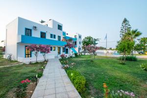 a house with a garden in front of it at Anthia Apartments in Marmari