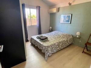 Ένα ή περισσότερα κρεβάτια σε δωμάτιο στο Villa Bourbon de charme +17 φωτογραφίες