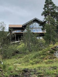 a house sitting on top of a hill at Bordalen-Voss 