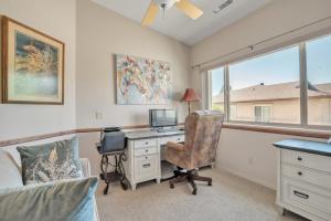 a bedroom with a desk with a computer and a bed at Prescott Luxury Home near Golf Course and Airport home in Prescott Valley