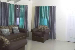 Area soggiorno di Ocean View Get Away