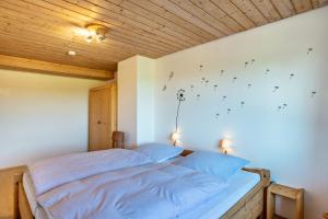 Postel nebo postele na pokoji v ubytování Haus Erlenmaier