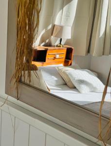 Letto o letti in una camera di Le vieux poirier à la Plaine des Cafres
