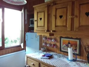 Kuchyň nebo kuchyňský kout v ubytování Chalet Jura
