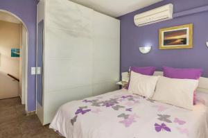 Postel nebo postele na pokoji v ubytování Bungalow DUNA FLOR VERDE Maspalomas + 15 fotografií