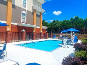 The swimming pool at or close to Holiday Inn Express McComb, an IHG Hotel