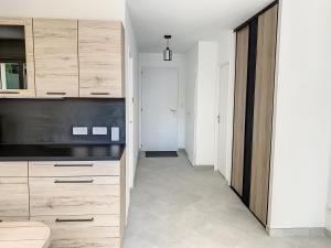 Kuchyň nebo kuchyňský kout v ubytování Chambre Evasion - SDB WC Privatif - Entrée autonome - Grande TV NETFLIX