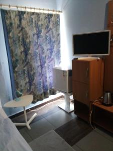 Televisor o centre d'entreteniment de Motelik Lukitas 38 fotos més