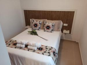 Postel nebo postele na pokoji v ubytování Apartamento Flores de Santiago