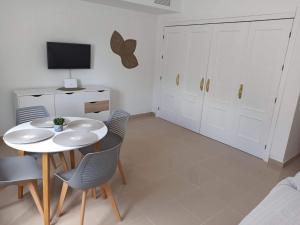 TV a/nebo společenská místnost v ubytování Apartamento Flores de Santiago